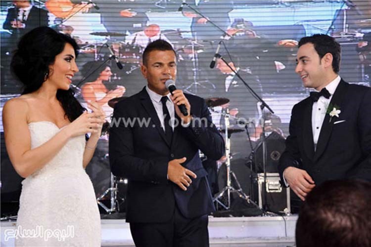 بالصور.. الهضبة يشدو بأجمل أغانيه في زفاف محمود عوض ونادين بيضون