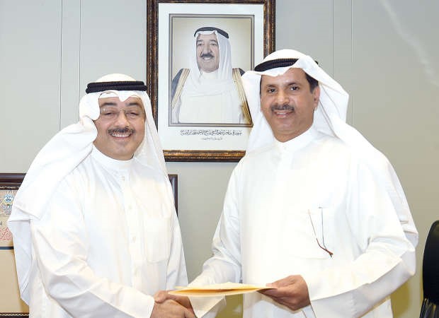 داحمد الاثري وخالد الشمالي عقب توقيع الاتفاقية ﻿