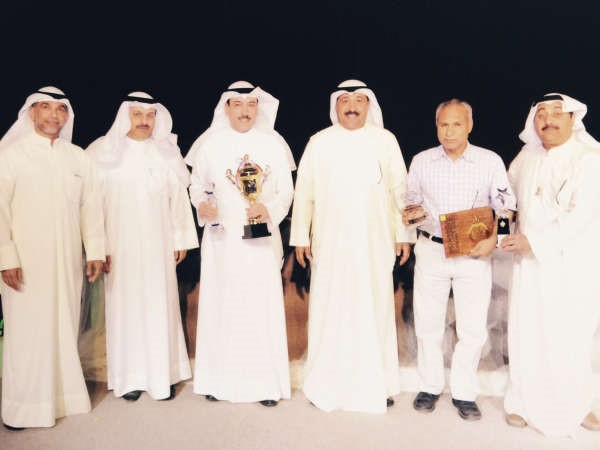  د ماجد العلى واحمد فرمن وموجهو التربية الكشفية اثناء تكريم احدى المدارس الفائزة 