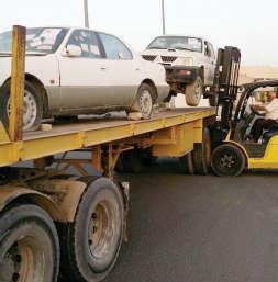 رفع احدى السيارات المهملة