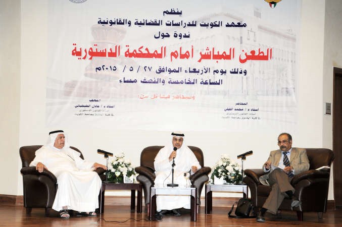  دمحمد الفيلي ودعادل الطبطبائي خلال الندوة	انور الكندري﻿