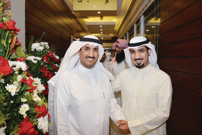 المحاميان خالد المطيري ومسفر عايض