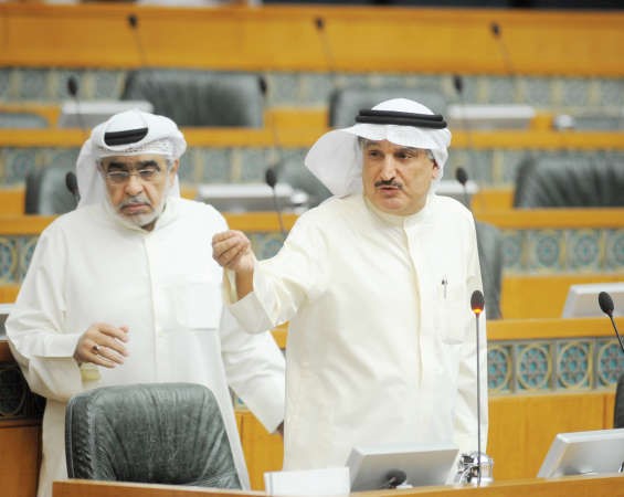 كامل العوضي وعدنان عبدالصمد
