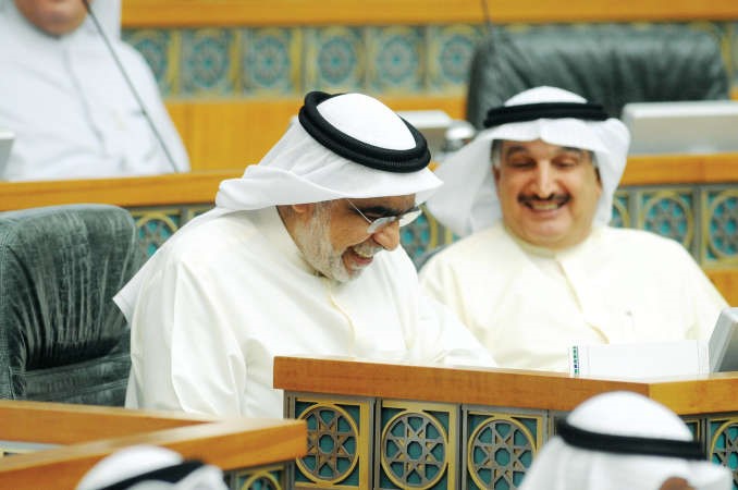 كامل العوضي وعدنان عبدالصمد

