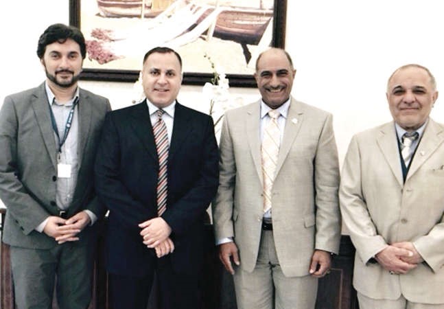 السفير جمال الغنيم مع اعضاء الوفد