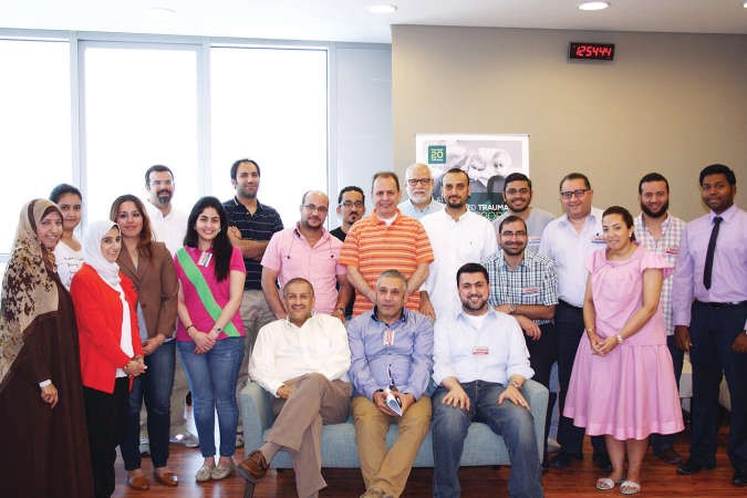لقطة جماعية للمتدربين ومسؤولي الاكاديمية 