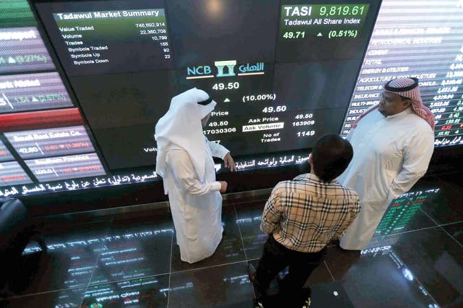 الاجانب مع السعوديين داخل البورصة السعودية اليوم الصورة لوول ستريت جورنال