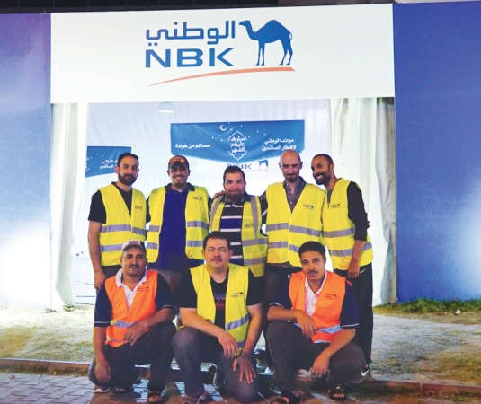 بعض متطوعي بنك الكويت الوطني﻿