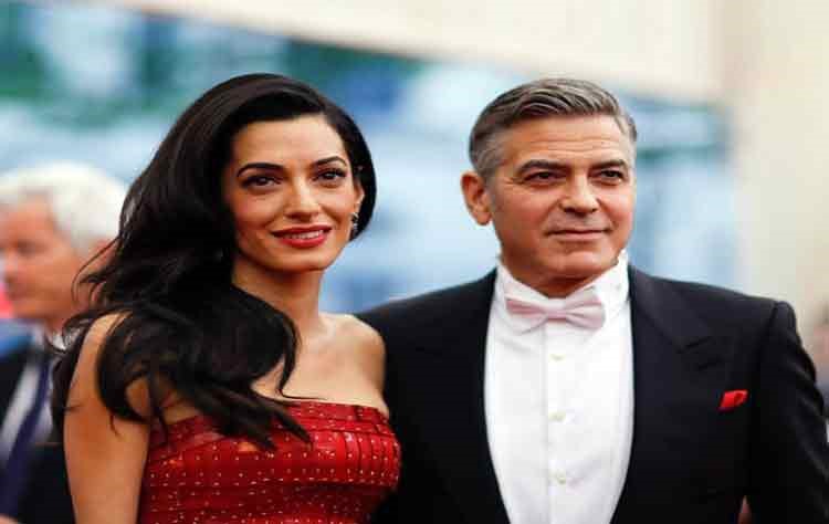 "جورج كلوني" وزوجته يثيران غضبًا في بريطانيا 