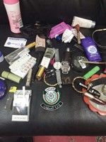 ادوات مكياج وعطور نسائية ضبطت مع المتشبهين