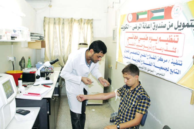 اجراء الكشف على الاطفال﻿