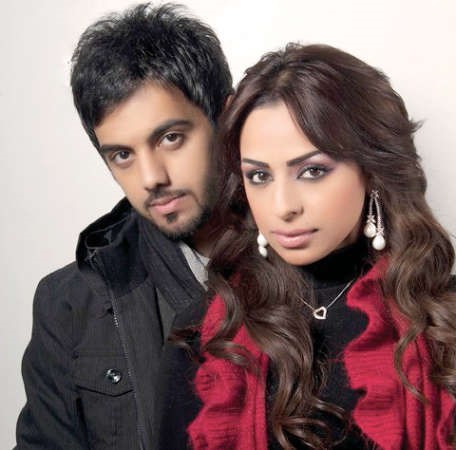  ومع زوجته الفنانة هند البلوشي
