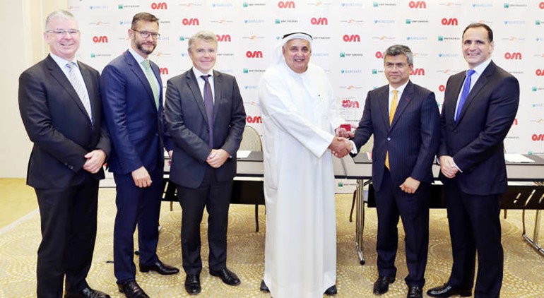 رئيس OSN والنائب التنفيذي لرئيس كيبكو فيصل العيار خلال اتمام صفقة التمويل المشترك﻿