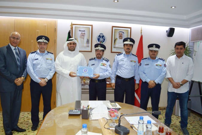 قيادات الاطفاء ومسؤولو شركة محمد عبدالمحسن الخرافي في لقطة جماعية 