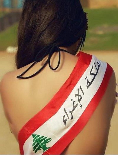 شاهد.. أخت هيفاء وهبي تهين العلم اللبناني بصورتها الجريئة