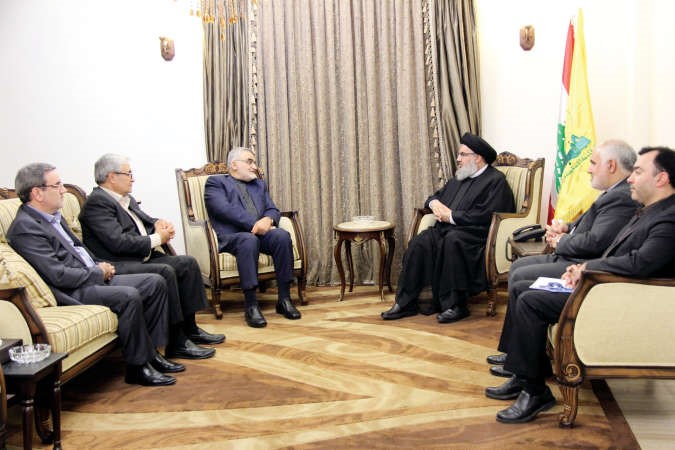 الامين العام لحزب الله حسن نصر الله مستقبلا رئيس لجنة الامن والسياسة الخارجية في مجلس الشورى الايراني علاء الدين بروجردي