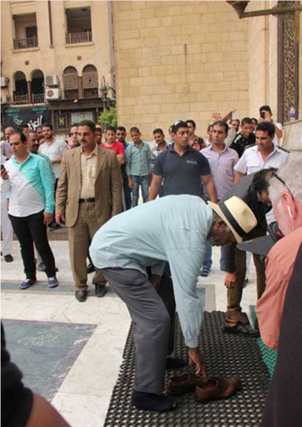بالصور.. مورجان فريمان يتجول في شوارع القاهرة