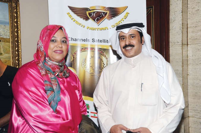 عبدالمحسن البرقاوي والزميلة هناء السيد