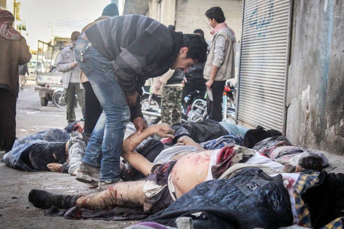 صورة وزعتها تنسيقية اريحا اليوم لضحايا الغارة الروسية على المدينة امس اپ