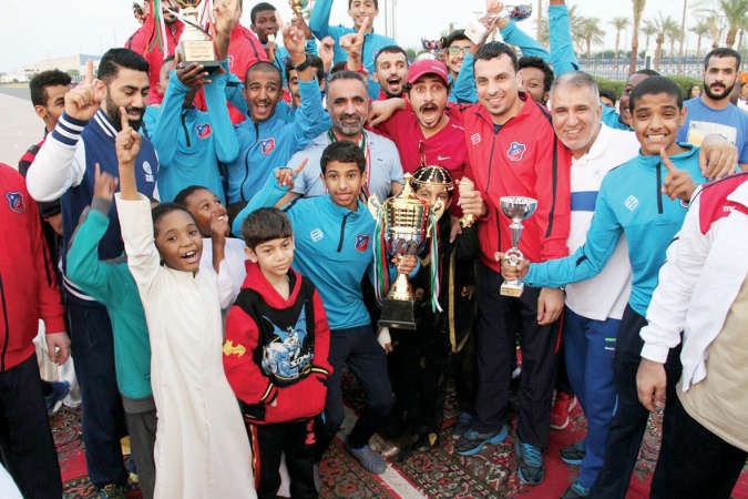 المدرب محمد الضامن يشارك الابطال فرحتهم 