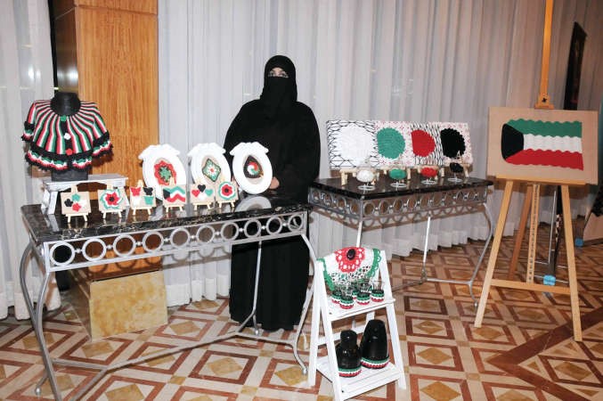 اعمال فنية على شكل علم الكويت خلال المعرض