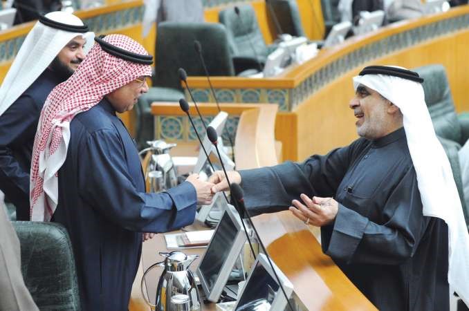 عدنان عبدالصمد والشيخ خالد الجراح﻿