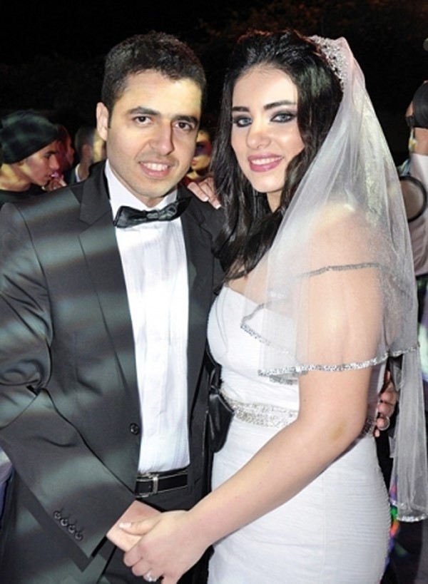 مروة نصر وزوجها محمد علام