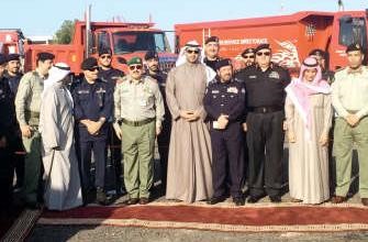 الشيخ محمد العبدالله متوسطا كبار قيادات الاطفاء خلال الاحتفال﻿