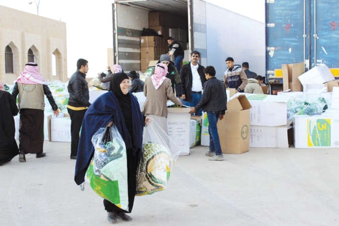 مساعدات وزعتها الحملة السعودية على عائلات نازحيين سوريين في عكار محمود الطويل