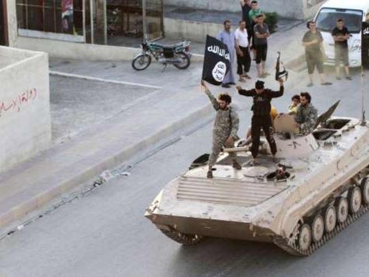بالصور.. هكذا تعيش الرقة متشحة بالسواد تحت حكم "الدواعش"
