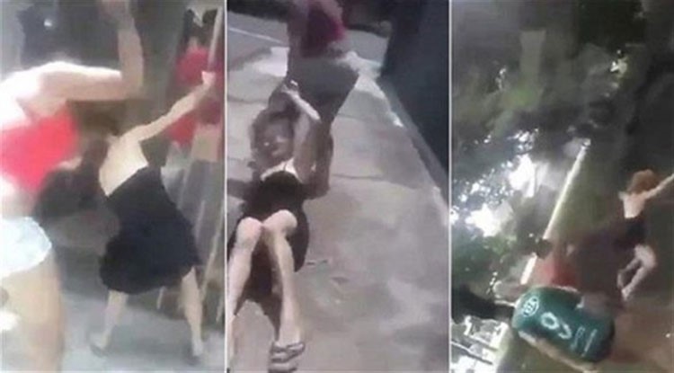 بالفيديو.. زوجة غيورة ترمي بعشيقة زوجها من فوق الجسر