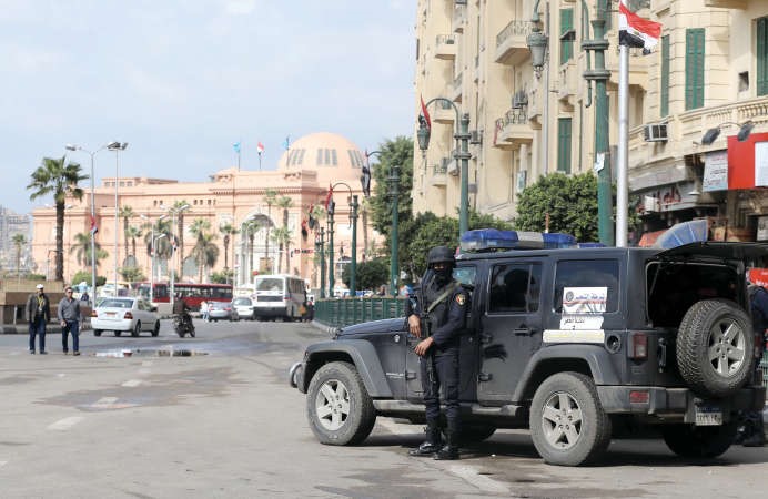 انتشار كبير لقوات الامن في ميدان التحرير لتامين المنطقة في الذكرى الخامسة لثورة 25 يناير	رويترز﻿