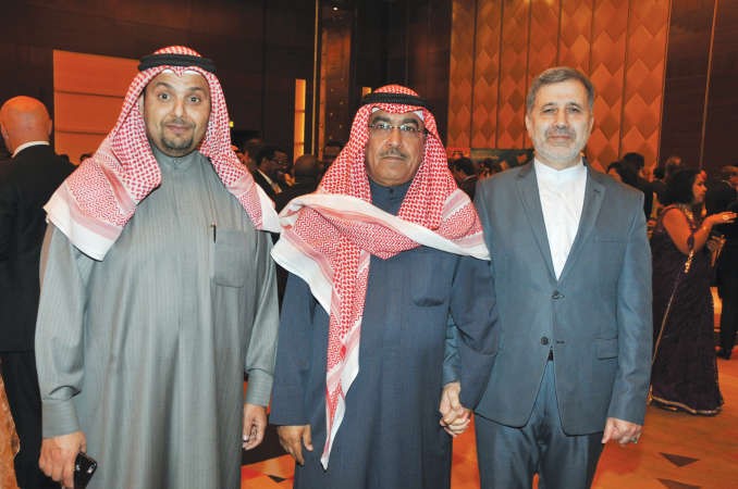 نائب رئيس التحرير الزميل عدنان الراشد والسفير الايراني علي عنايتي 