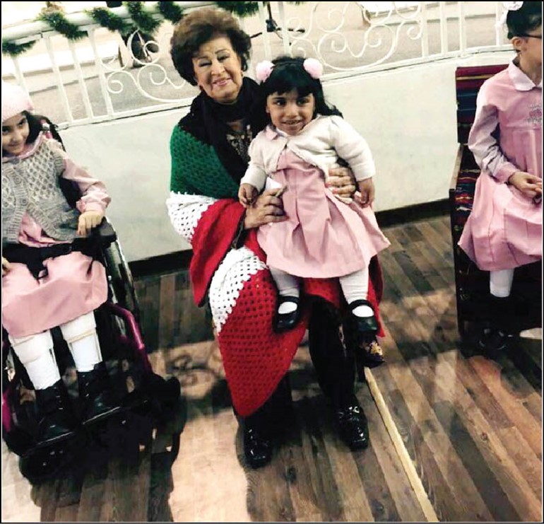 ماما انيسة لدى مشاركتها في برنامج عيال الديرة