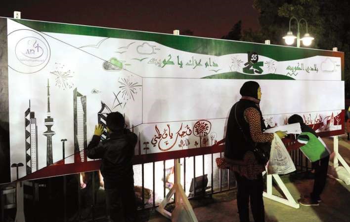 الرسم على جدارية وطني الكويت في ماراثون الفن﻿