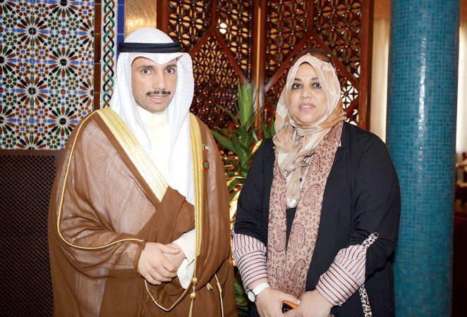 الرئيس الغانم مع الزميلة هناء السيد ﻿
