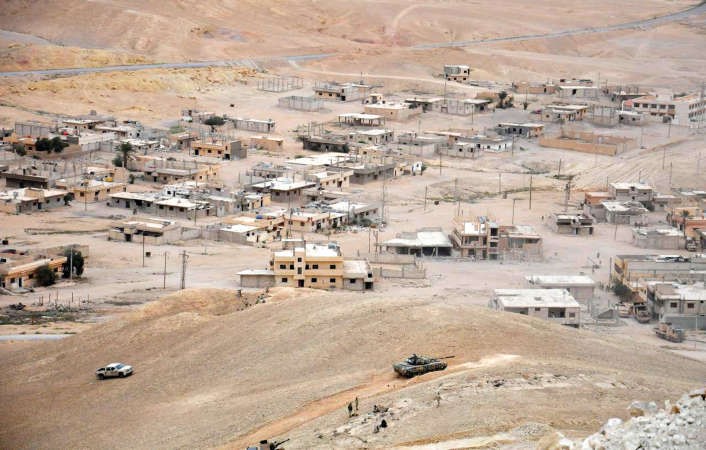 قوات النظام السوري لدى دخولها المنطقة السكنية من مدينة تدمر افپ
