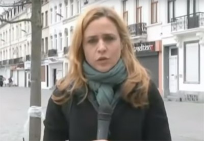 بالفيديو.. صحافية تكمل رسالتها رغم الاعتداء عليها في بلجيكا