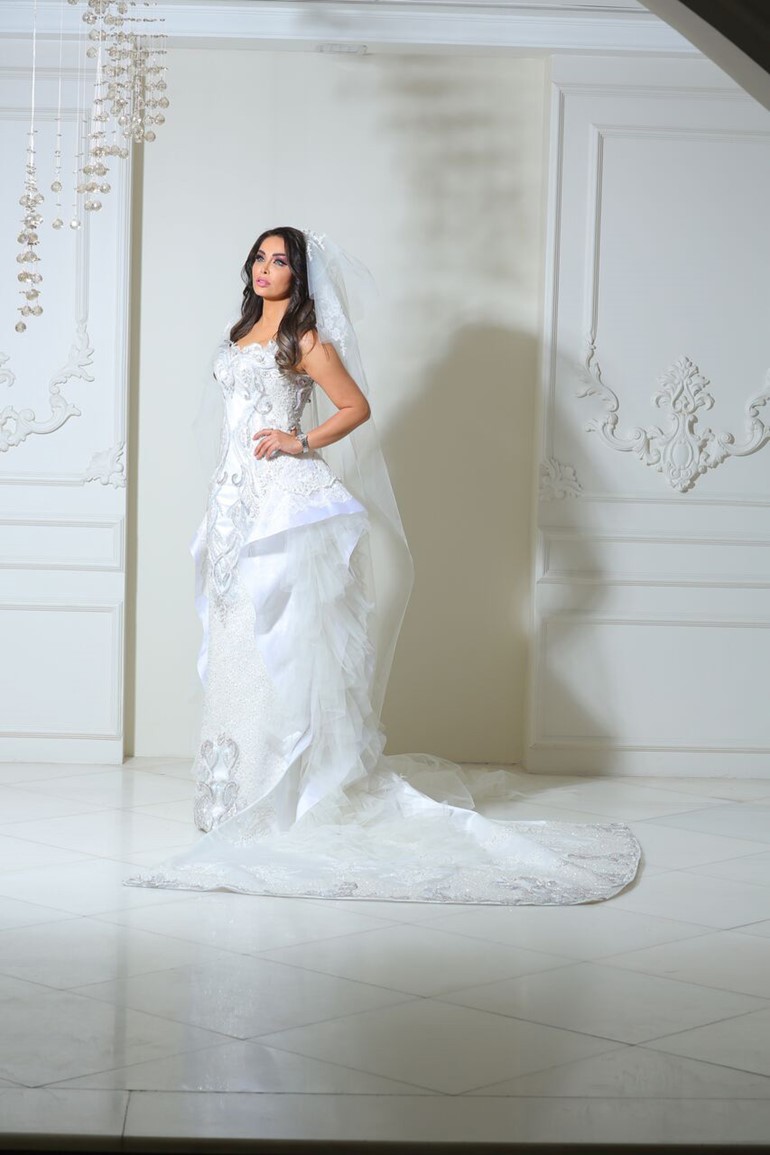 بالصور : جلسة تصويرية تجمع هيا الحوطي بمصمم أزياء شهير ..تعرفوا عليه