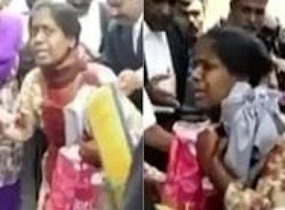 بالفيديو.. رجل يقطع حنجرة زوجته داخل قاعة المحكمة