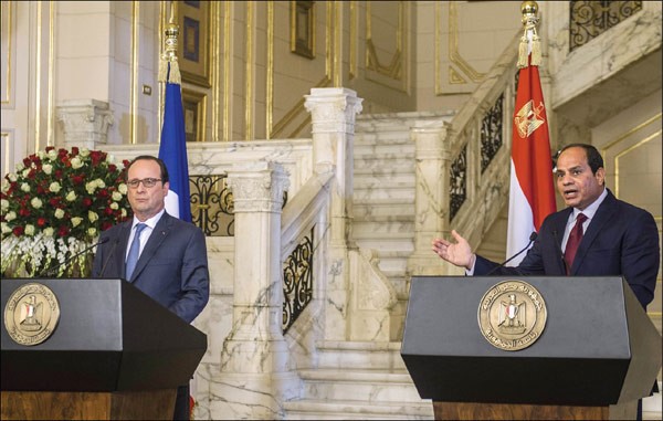 الرئيس المصري عبد الفتاح السيسي خلال المؤتمر الصحافي مع نظيره الفرنسي فرانسوا هولاند في قصر القبة الرئاسي	 افپ