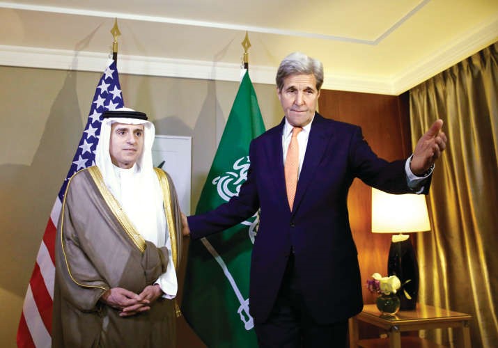 وزيرا الخارجية السعودي عادل الجبير والاميركي جون كيري خلال اجتماعهما في جنيف امساپ