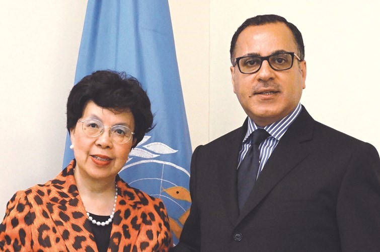 السفير جمال الغنيم ومديرة منظمة الصحة العالمية مارغريت تشان 