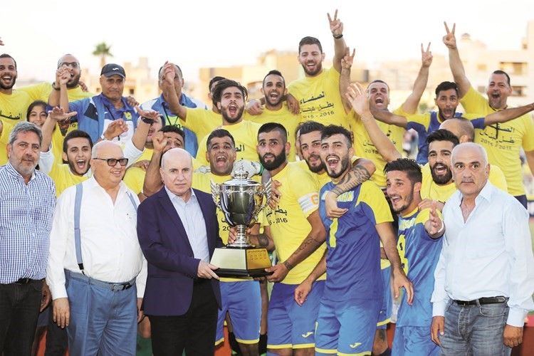 فرحة لاعبي الصفاء بالحصول على لقب الدوري اللبناني