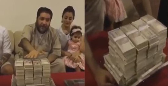 بالفيديو.. والد الفنانة شهد يضع حفيدته على الميزان ويهديها أموالاً بقدر وزنها 