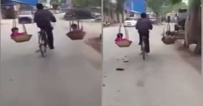 بالفيديو.. صيني ينقل طفليه على دراجة بشكل لا يصدق
