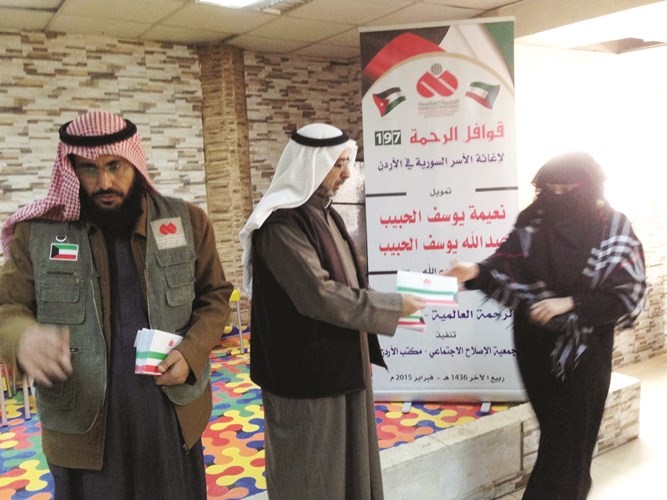 توزيع المساعدات لاغاثة الاسر السورية في الاردن