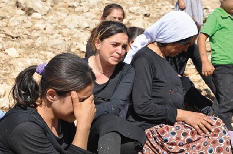 صورة ارشيفية لايزيديات عانين من داعش