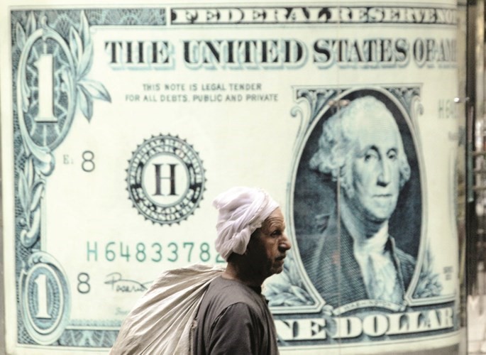  تراجع الجنيه المصري دفع الشركات الكويتية لاستثمار ارباحها في العقارات وسندات الخزانة هربا من تقلبات العملة الكبيرة﻿