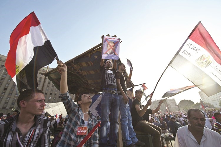 لقطة ارشيفية لثورة 30 يونيو التي شهدت اسقاط حكم الاخوان بعد عام واحد فقط 	افپ﻿